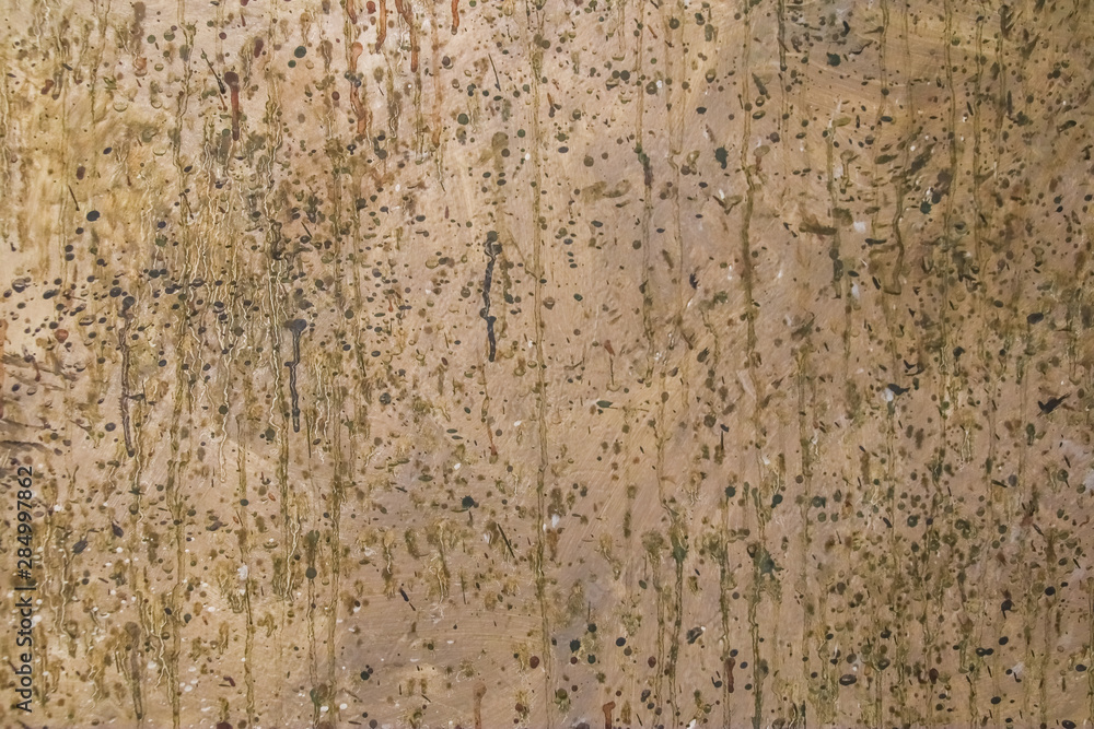 Color abstract painted background splashes of paint on old brown cement wall Color abstract painted background splashes of paint on old brown cement wall