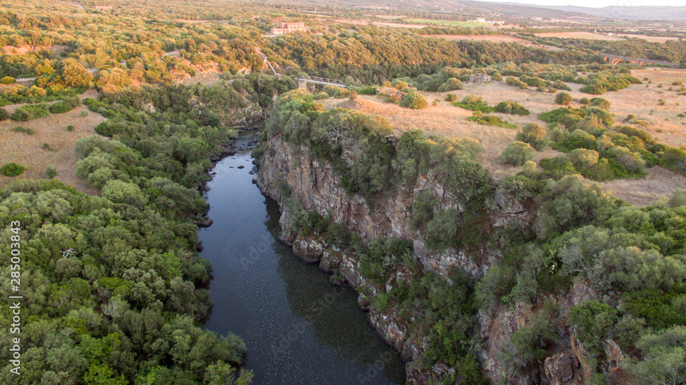 curve of the river with canyon at the sunset seen from above with the drone