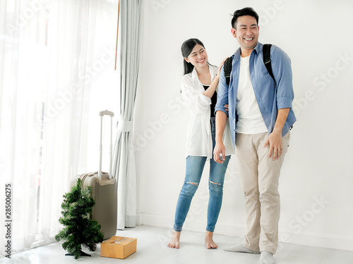 Happy young couple in love move to new home, lifestyle concept.