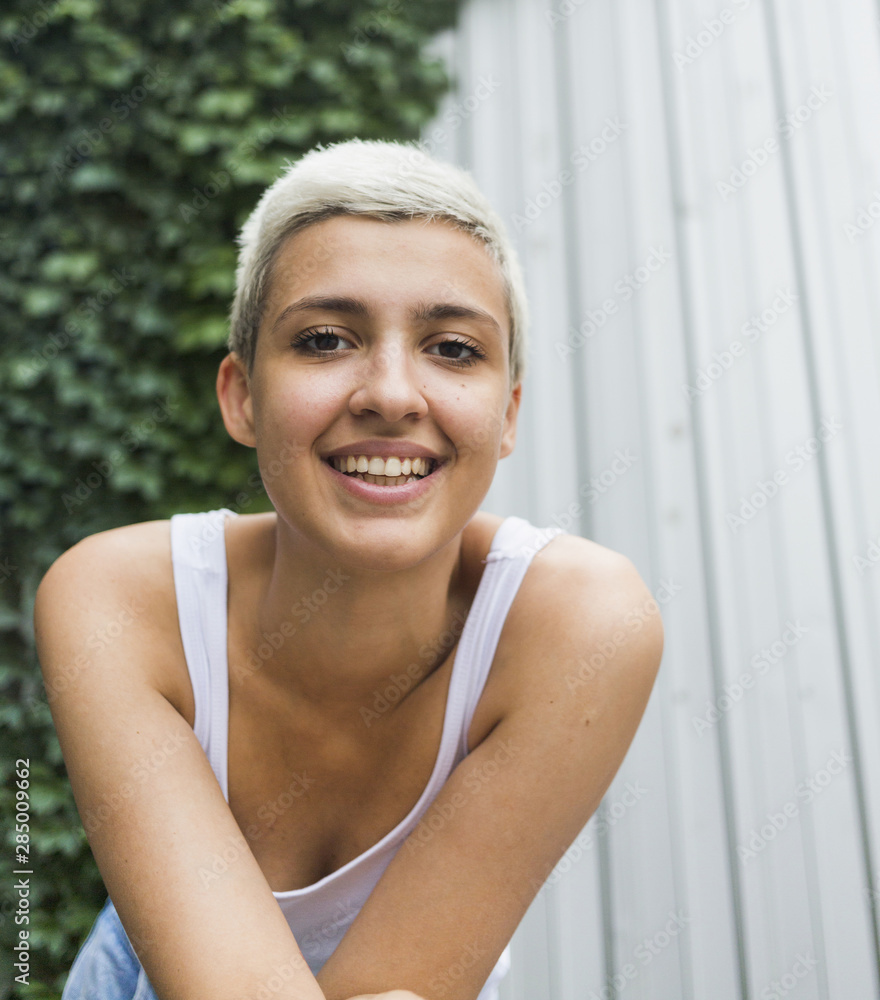 Fototapeta premium Smiling woman with short hair