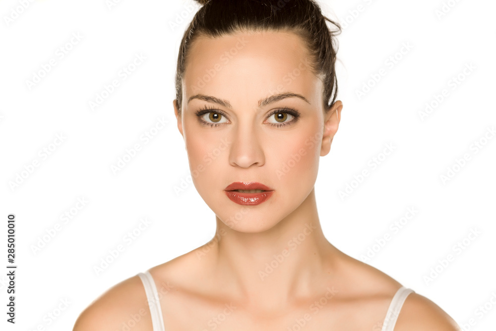 Portrait of beautiful young woman on white background Portrait of beautiful young woman on white background