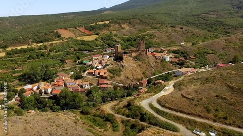 Wallpaper Mural Aerial drone footage of medieval Aragon village of Vozmediano and castle ruins with Moncayo mountains in the background . Torontodigital.ca