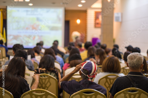 blurred background. many people are sitting at the meeting room for business seminar. Is a workshop of entrepreneurs.