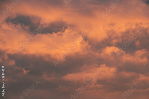 Sky at sunrise. Skyscape with bright pink clouds © karinabost