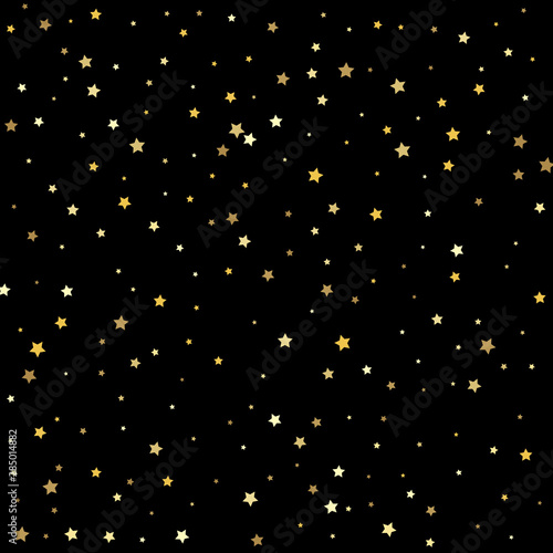 Abstract pattern of random falling gold stars. Texture of gold foil.