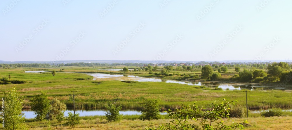 view of countryside,landscape, sky, nature, water, grass, river, green, lake, field, blue, meadow, tree, summer, cloud, panorama, countryside, view, rural, country, forest, trees, land, clouds, scener