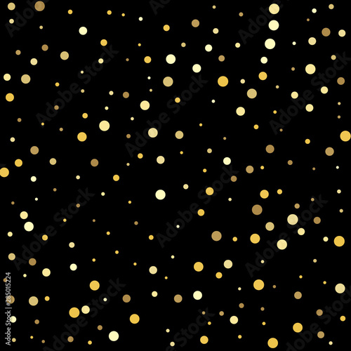 Texture of gold foil. Abstract pattern of random falling gold dots.