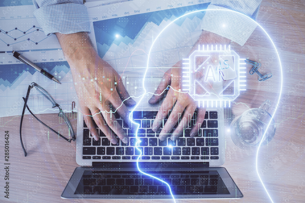 Man typing on keyboard background with brain hologram. Concept of big Data. Man typing on keyboard background with brain hologram. Concept of big Data.