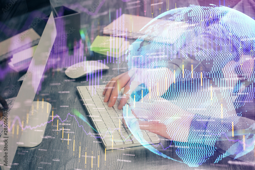 Double exposure of stock graph with businessman typing on computer in office on background. Concept of hard work. Double exposure of stock graph with businessman typing on computer in office on background. Concept of hard work.