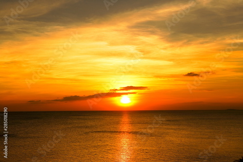 sunset above the sea with beautiful sky
