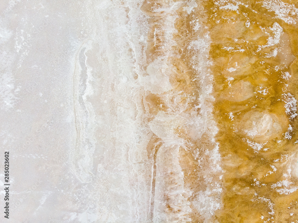 Aerial view of Lake Tuz, Tuz Golu. Salt Lake. White salt water. It is the second largest lake in Turkey and one of the largest hypersaline lakes in the world. Central Anatolia. Background, texture Aerial view of Lake Tuz, Tuz Golu. Salt Lake. White salt water. It is the second largest lake in Turkey and one of the largest hypersaline lakes in the world. Central Anatolia. Background, texture