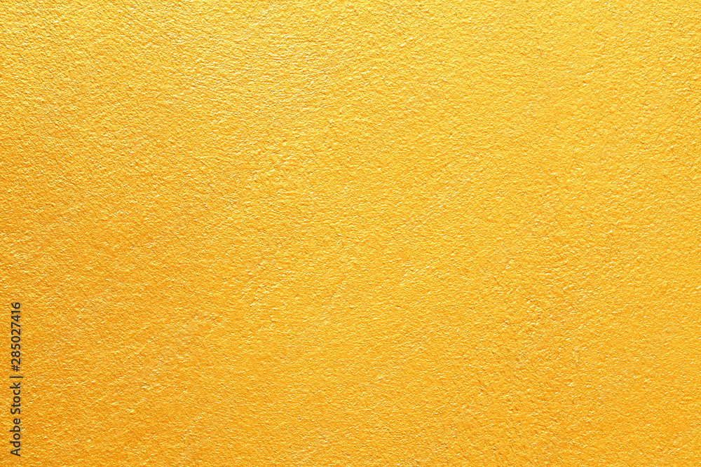 Golden textured wall for background and luxurious graphic design purpose Golden textured wall for background and luxurious graphic design purpose