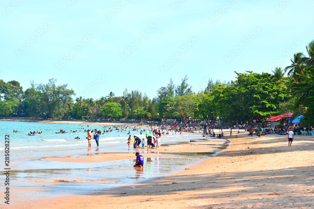 Hin Ngam Beach, Nakhon Si Thammarat Province, Thailand - 13 April 2019: Portrait of people playing in the sea and resting on holidays. Hin Ngam Beach, Nakhon Si Thammarat Province, Thailand - 13 April 2019: Portrait of people playing in the sea and resting on holidays.