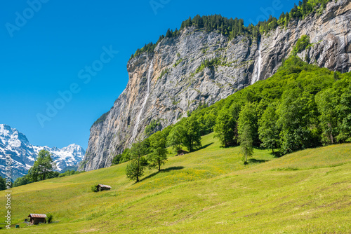 Landscape in the Lauterbrunnen Valley with the Spissbach Falls and the Staubbach Falls in Lauterbrunnen