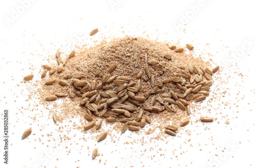 Spelt bran and grains isolated on white background