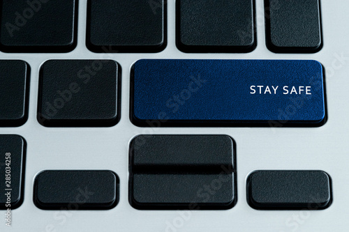 Virus Text on Laptop Blue Keyboard Button. Theme of Online Security and Internet Security. Data Privacy Terms.