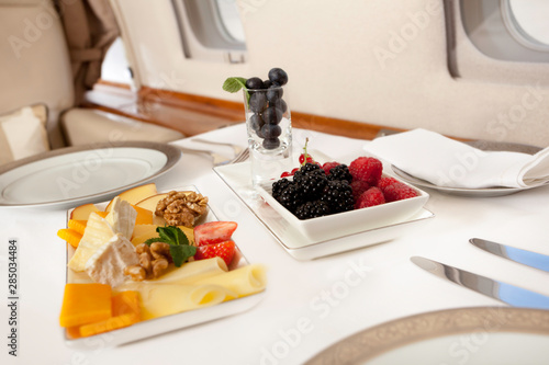 фотографія Food served on board of business class airplane.