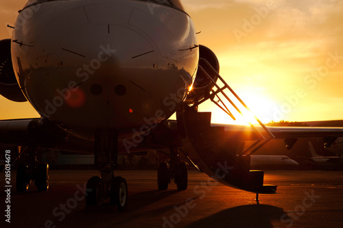 Business jet plane on the ground.
