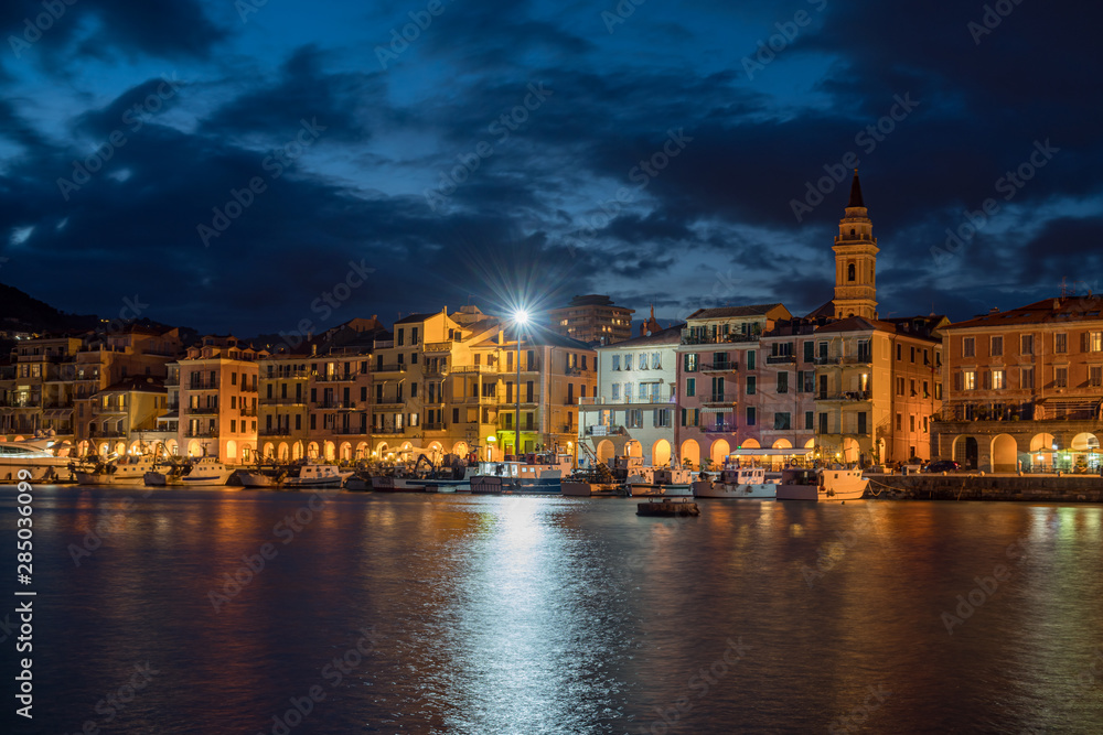 Neighbourhood Oneglia by night - old harbor of the city of Imperia, Italy