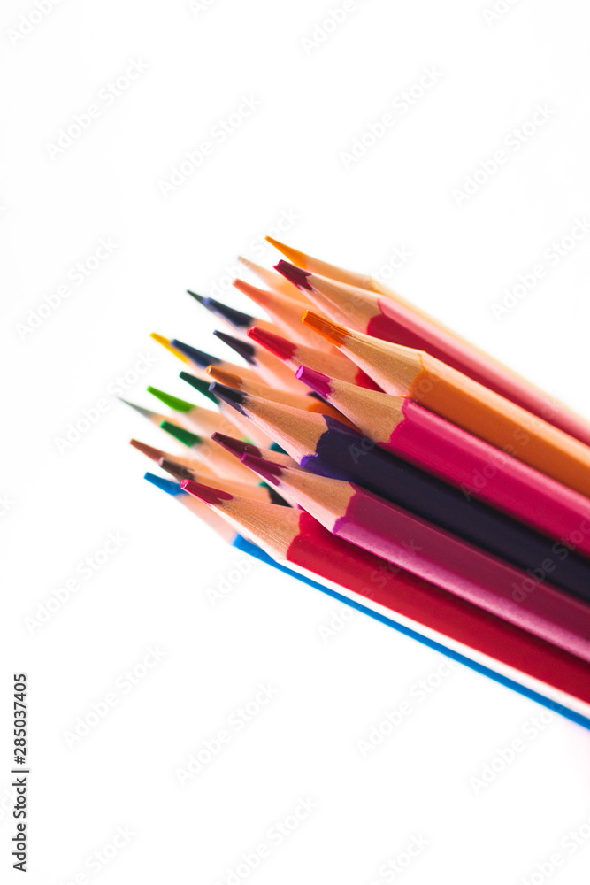 Color pencils with copy space isolated on white background close up view. Back to school. Color pencils with copy space isolated on white background close up view. Back to school.