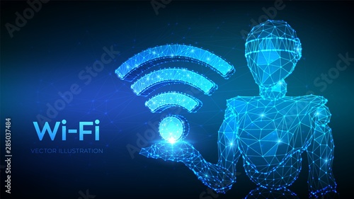 Wi-Fi. Low poly abstract Wi Fi sign. Wlan access, wireless hotspot signal symbol. Mobile connection zone. Data transfer. Abstract 3d low polygonal robot holding WiFi icon. Vector illustration. photo