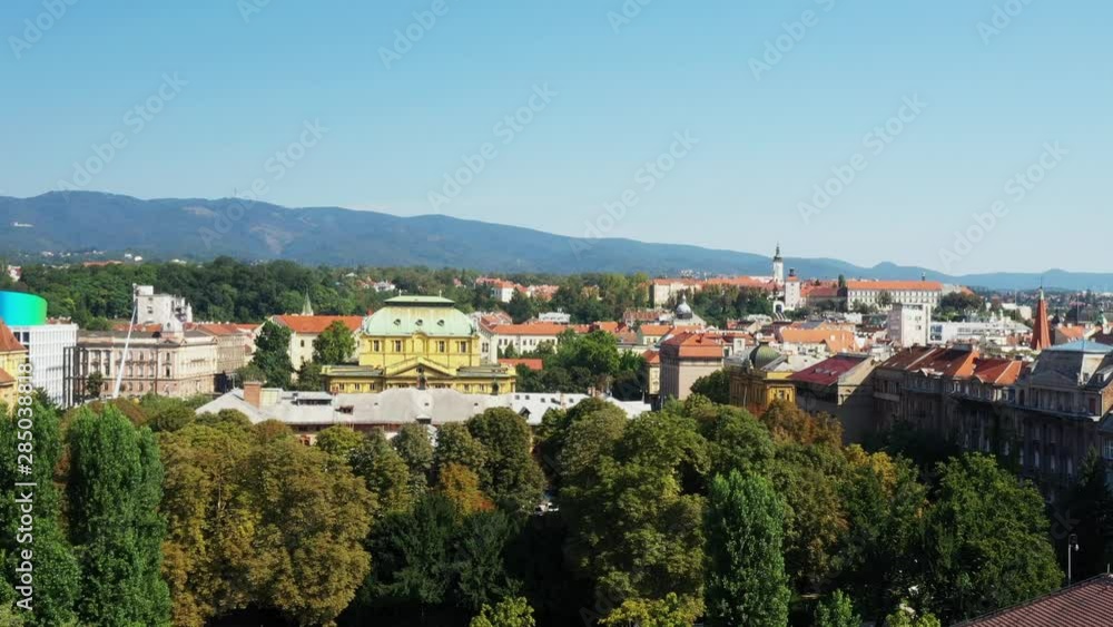 Croatia, Zagreb, panorama of the city center with a view to the Croatian national theater, drone reveal shot Croatia, Zagreb, panorama of the city center with a view to the Croatian national theater, drone reveal shot