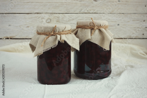 Jars of jam on a light background