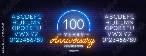 100th anniversary celebration neon sign on dark background. Neon alphabet . Template for invitation or greeting card.