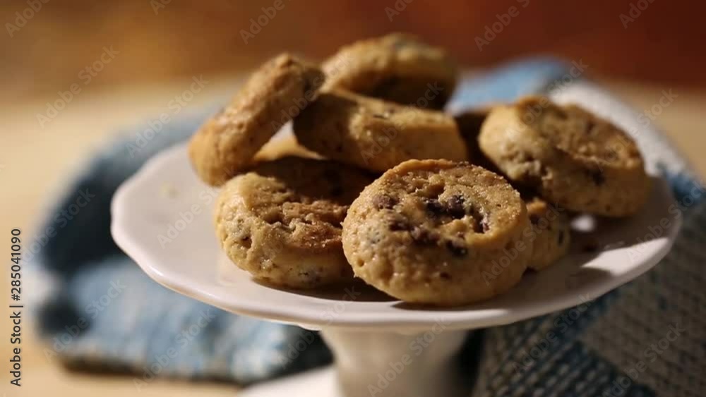 Chip cake cookies with chocolate pieces, close up rotation loopable. Food background. Gastronomy concept. Macro tasty chip cake cookies with chocolate Chip cake cookies with chocolate pieces, close up rotation loopable. Food background. Gastronomy concept. Macro tasty chip cake cookies with chocolate