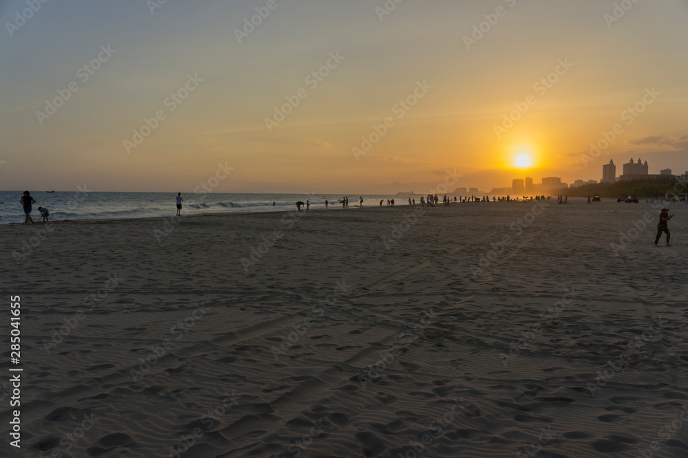 Naklejka premium sunset on the coast of the south china sea linshui clean water bay in hainan province