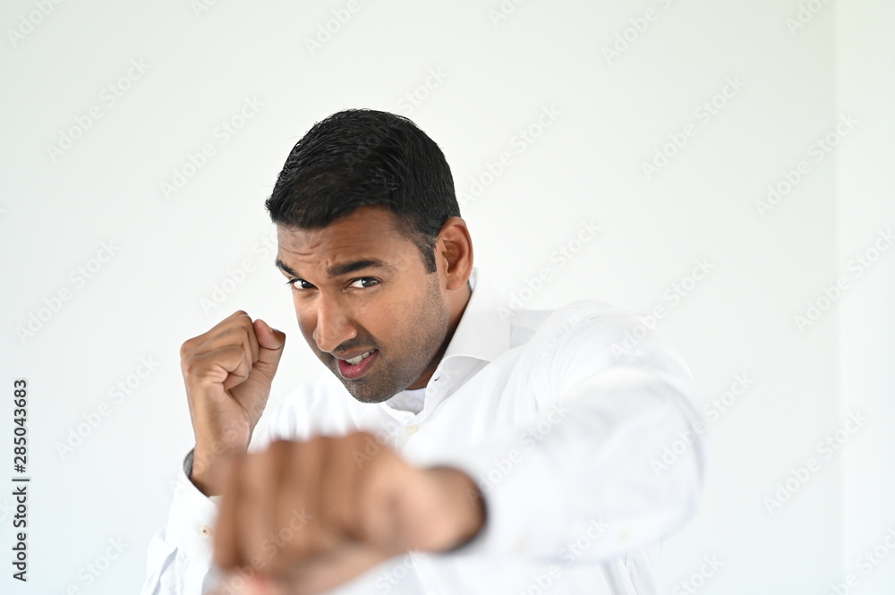 Successful and good looking businessman is ready for some action Successful and good looking businessman is ready for some action
