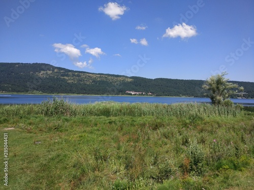 landscape with lake and blue sky