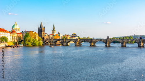 Prague cityscape and Charles bridge over Vltava river, Czech Republic