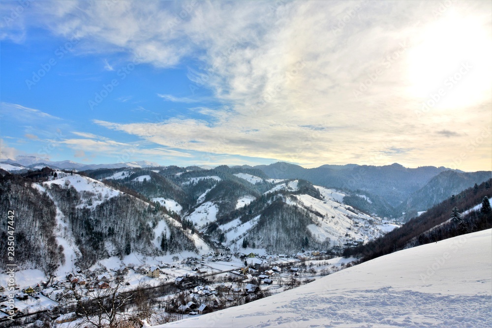 landscape with Cheia village and Bucegi mountains in winter