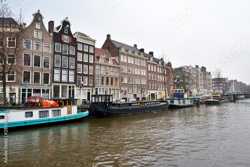 View on the crooked houses of Amsterdam from a canal, Netherlands
