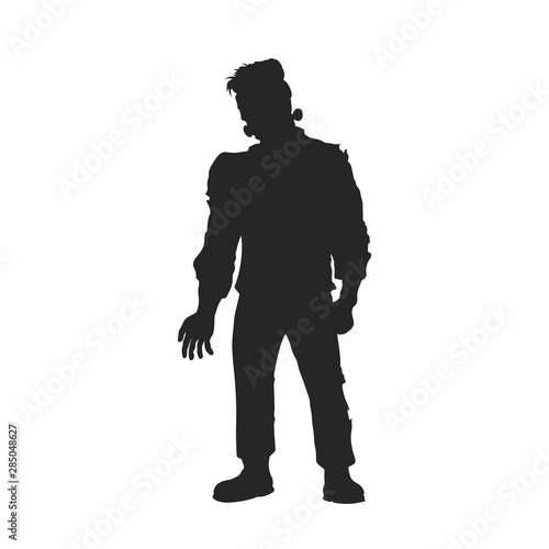 Black silhouette of frankenstein monster. Halloween party. Isolated image of scary zombie. Dead man on white background photo