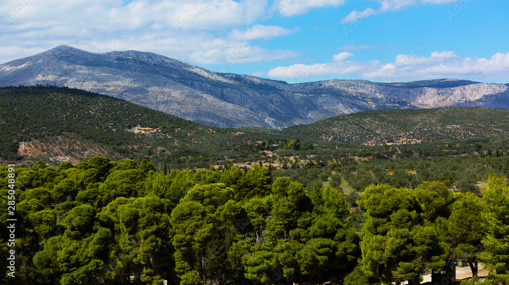 Fototapeta premium Mountain view from the amphitheatre of Epidaurus. Argolida prefecture, Peloponnese, Greece.
