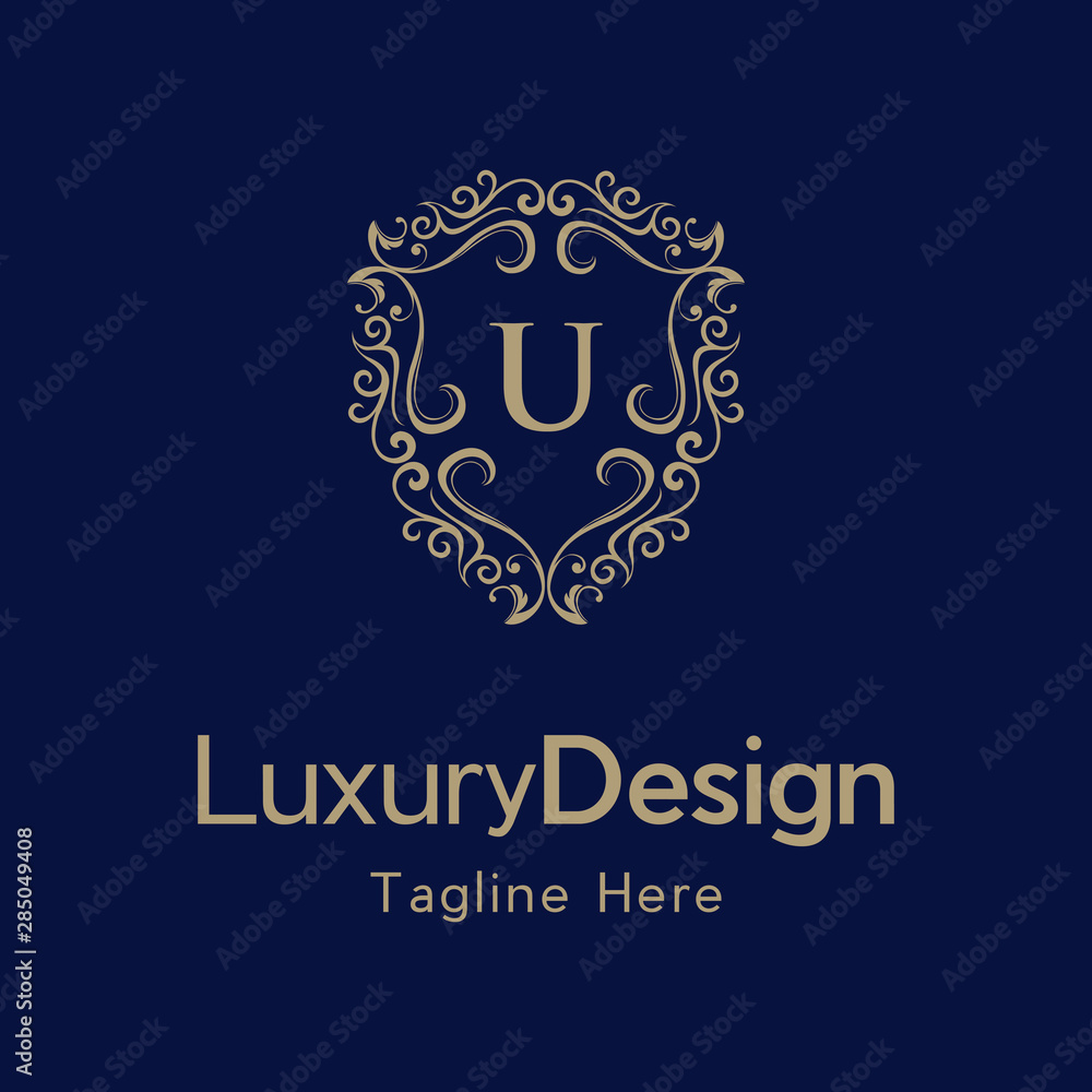 Exquisite baroque pattern. Floral ornament with initial letter U. Golden letter U logo Luxury letter with shield. Exquisite baroque pattern. Floral ornament with initial letter U. Golden letter U logo Luxury letter with shield.