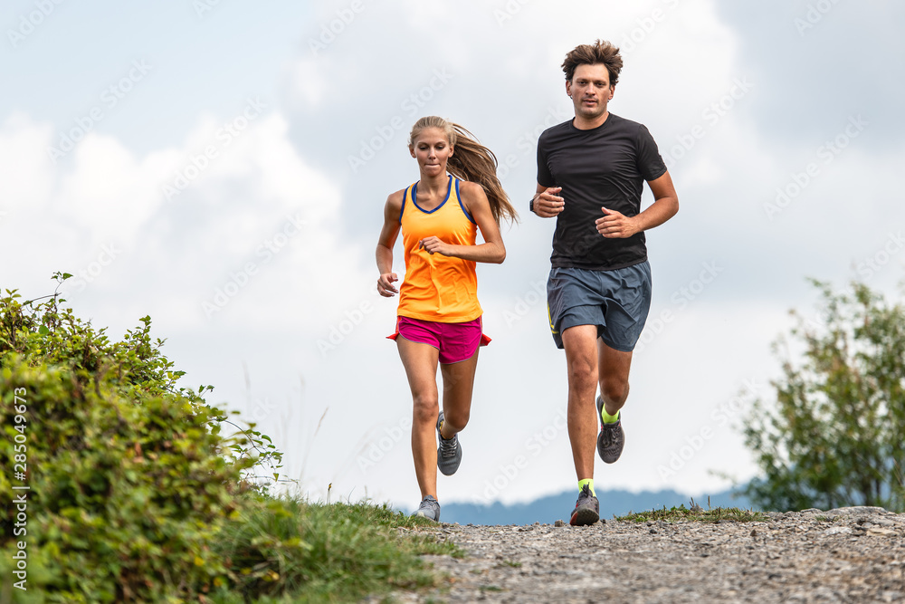 Pair of trail runners in the mountains Pair of trail runners in the mountains