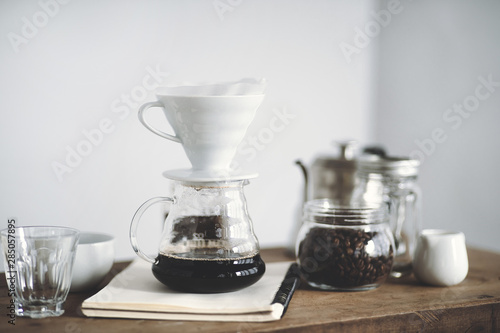 Drip coffee on a wooden bar White background
