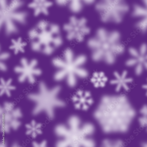 Christmas seamless pattern of white defocused snowflakes on purple background