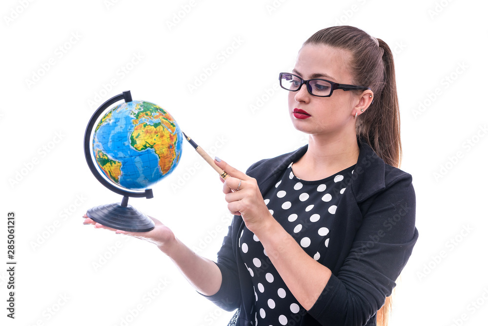 Woman holding globe and pointing on it isolated on white Woman holding globe and pointing on it isolated on white