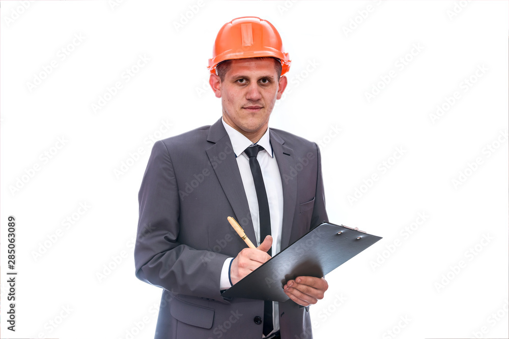 Man in helmet holding clipboard isolated on white Man in helmet holding clipboard isolated on white