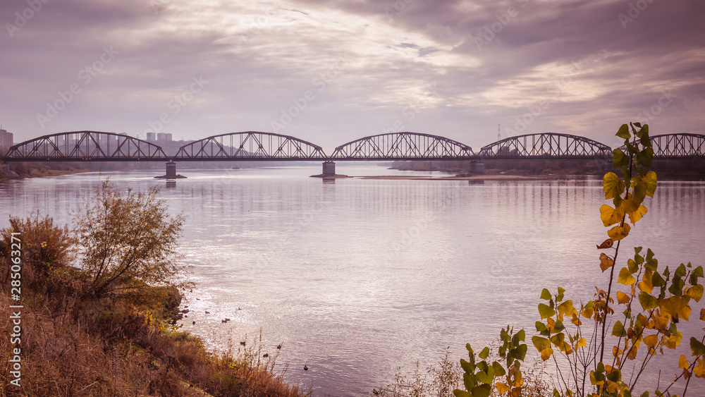 Naklejka premium Steel road and railway bridge on the Vistula River in Grudziadz in Poland