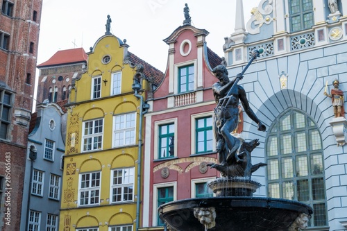 Neptune fountain with a trident on one of the main streets of the old city of Gdansk in Poland
