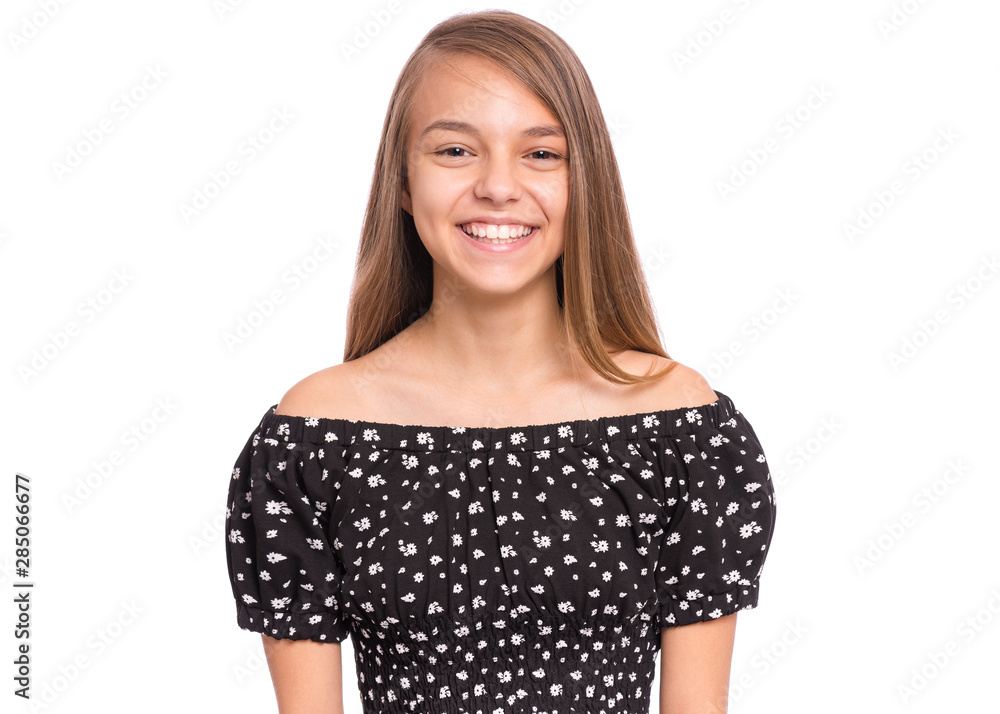 Beautiful teen girl smiling looking at camera. Portrait of young pretty  funny child with perfect smile and white teeth, isolated on white  background. Young happy teenager posing in studio. Stock-Foto | Adobe