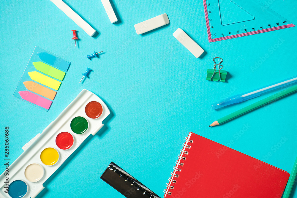 Back to school mock up. Flat lay composition with a watercolor, pencil, notebooke, ruler, eraser. Isometric concept on blue background. Pop art. School supplies. overhead. Branding mock up stationery Back to school mock up. Flat lay composition with a watercolor, pencil, notebooke, ruler, eraser. Isometric concept on blue background. Pop art. School supplies. overhead. Branding mock up stationery