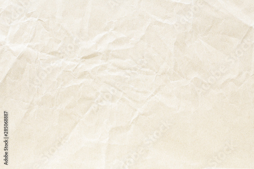 Crumpled brown yellow paper texture