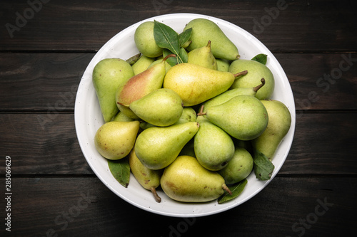 Fresh organic pears in bowl