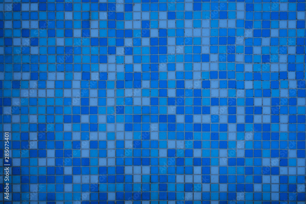 Swimming pool bottom caustics ripple and flow with waves background. Summer background. Texture of water surface. Overhead view. Swimming pool bottom caustics ripple and flow with waves background. Summer background. Texture of water surface. Overhead view.